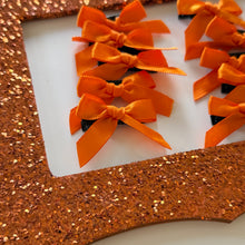 Load image into Gallery viewer, Orange Mini Clip Bows (set of 10)
