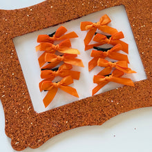 Load image into Gallery viewer, Orange Mini Clip Bows (set of 10)
